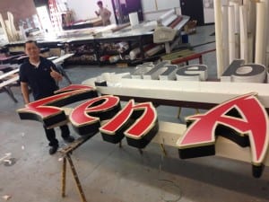 Man building a sign